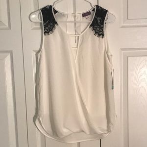White Sleeveless Blouse with Black Lace Details